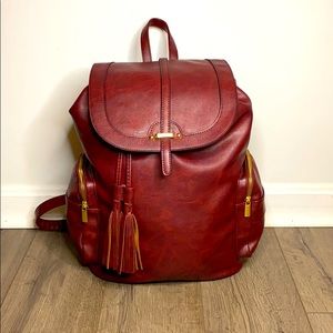 Burgundy faux leather backpack